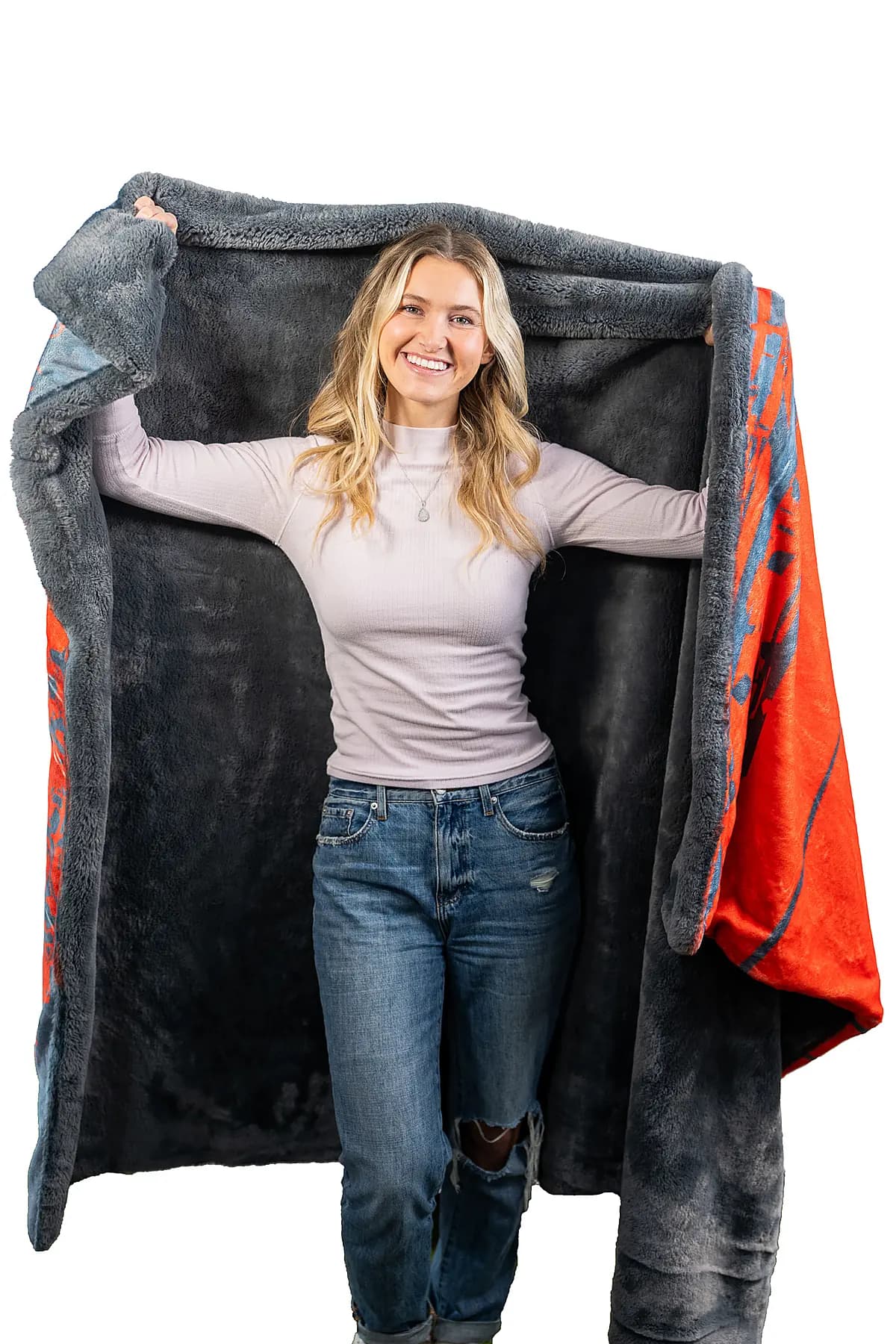 A Swanky Blankey held open to show the printed front and its plush faux-fur reverse
